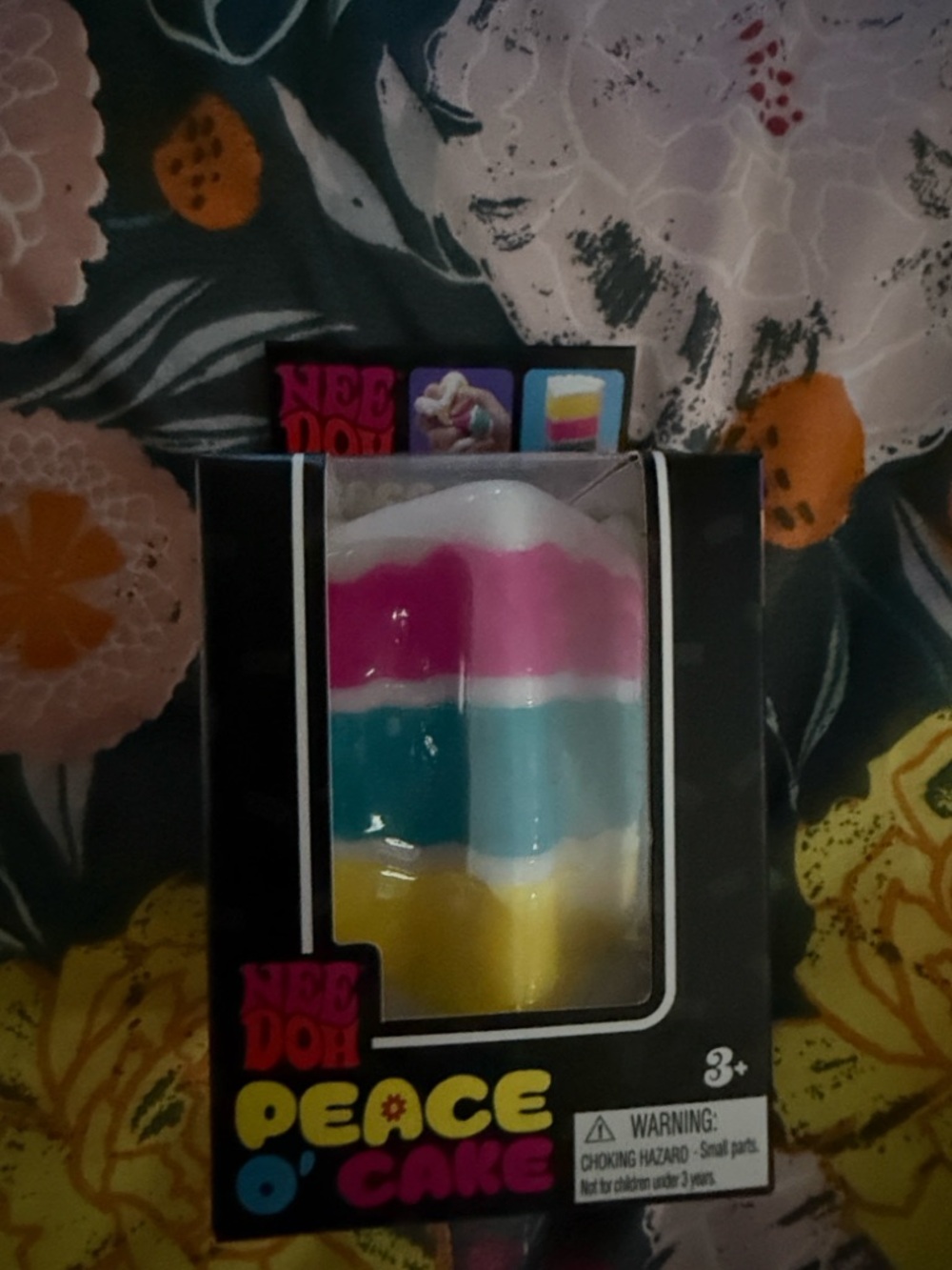 NeeDoh Peace O' Cake Rainbow Layered Squishy Toy - Pink, Yellow, Blue, White - Picture 4 of 7